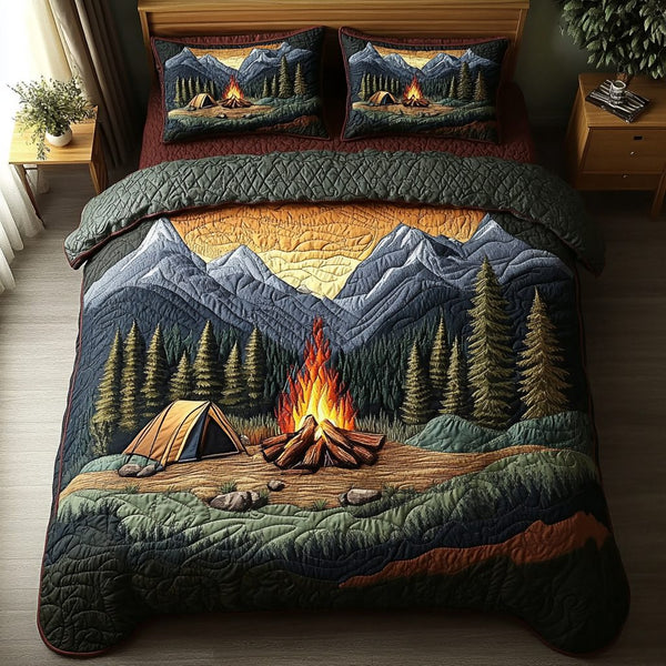 Starry Night Camp quilted 3-piece bedding set on a made bed with two matching pillow shams