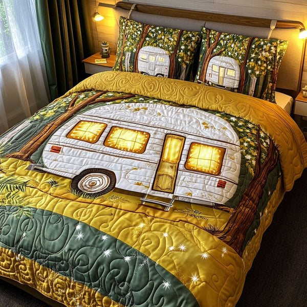 Starry Retreat quilted 3-piece bedding set on a made bed with two matching pillow shams