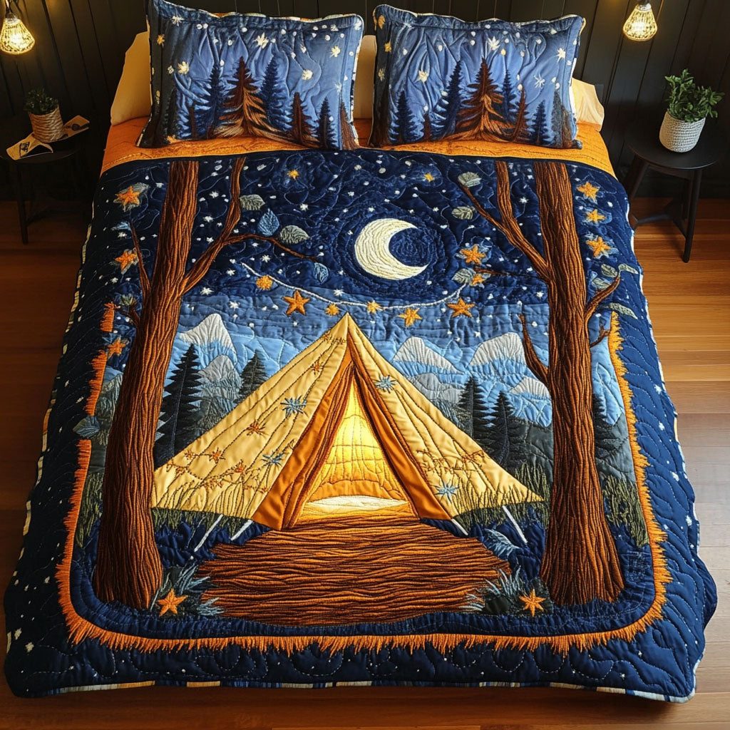 Starry Tent quilted 3-piece bedding set on a made bed with two matching pillow shams