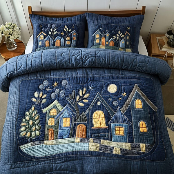 Starry Town quilted 3-piece bedding set on a made bed with two matching pillow shams