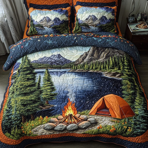 Starry Wilderness quilted 3-piece bedding set on a made bed with two matching pillow shams
