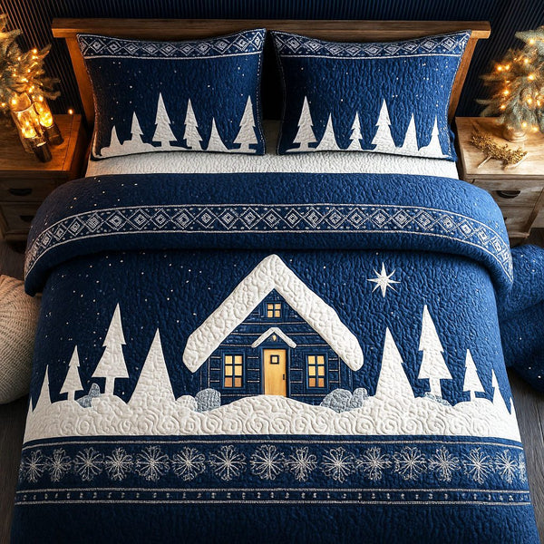 Starry Winter Cabin quilted 3-piece bedding set on a made bed in a winter-styled bedroom