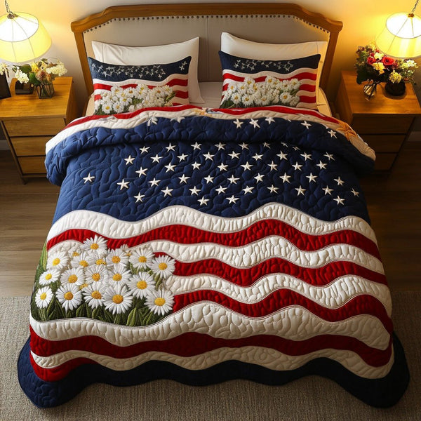 Stars and Stripes quilted 3-piece bedding set on a made bed with two matching pillow shams