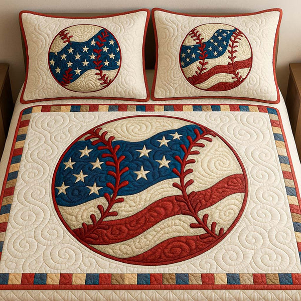 Stars and Stripesball quilted 3-piece bedding set on a made bed with two matching pillow shams