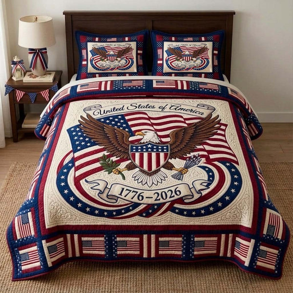 Stars Freedom Emblem quilted 3-piece bedding set on a made bed in a warmly lit bedroom