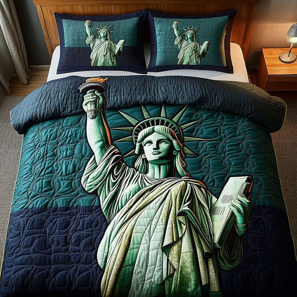 Statue of Freedom quilted 3-piece bedding set on a made bed in a warmly lit bedroom