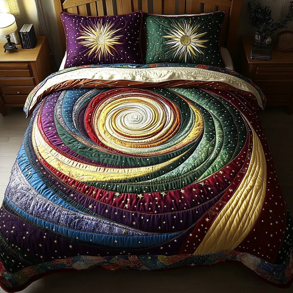 Stellar Dreams quilted 3-piece bedding set on a made bed with two matching pillow shams