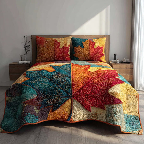 Stellar Leaf Motif quilted 3-piece bedding set on a made bed with two matching pillow shams