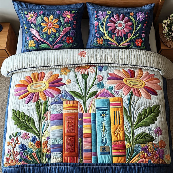 Stitched Stories quilted 3-piece bedding set on a made bed with two matching pillow shams