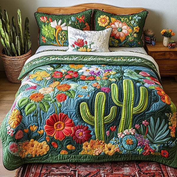 Succulent Bliss quilted 3-piece bedding set on a made bed with two matching pillow shams