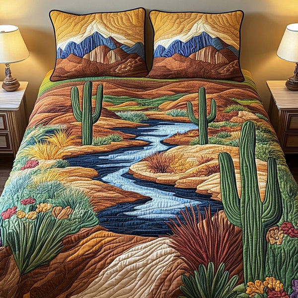 Succulent Dreams quilted 3-piece bedding set on a made bed with two matching pillow shams