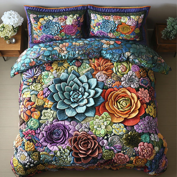 Succulent Garden quilted 3-piece bedding set on a made bed with two matching pillow shams