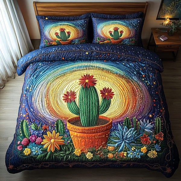 Succulent Glow quilted 3-piece bedding set on a made bed with two matching pillow shams
