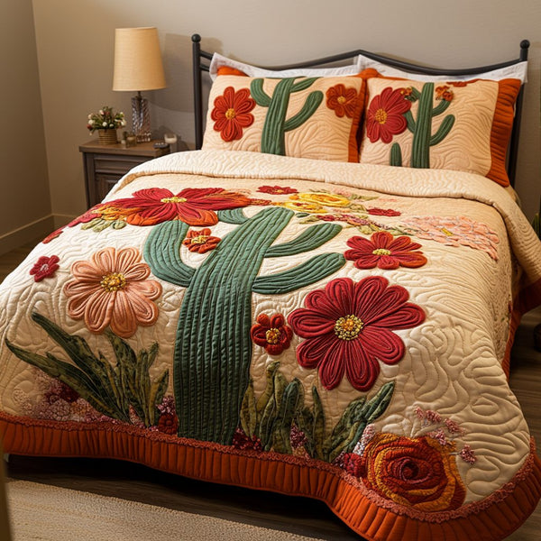 Succulent Glow quilted 3-piece bedding set on a made bed with two matching pillow shams