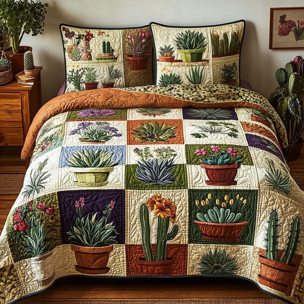 Succulent Sway quilted 3-piece bedding set on a made bed with two matching pillow shams