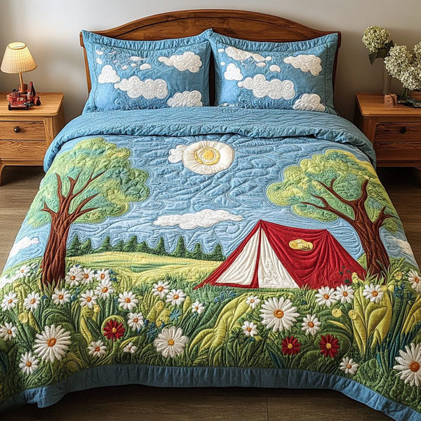 Summer Bliss quilted 3-piece bedding set on a made bed with two matching pillow shams