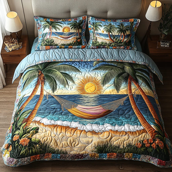 Summer Bliss quilted 3-piece bedding set on a made bed with two matching pillow shams