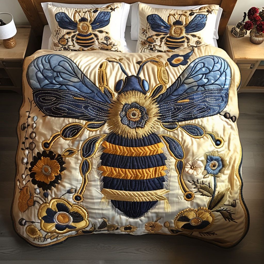 Summer Bloom quilted 3-piece bedding set on a made bed with two matching pillow shams