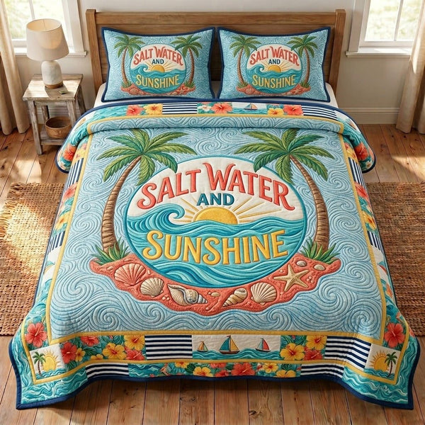 Summer Escape quilted 3-piece bedding set on a made bed with two matching pillow shams