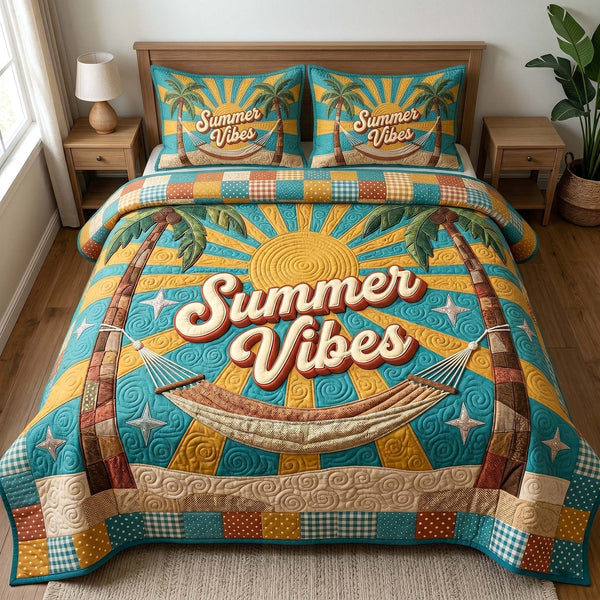 Summer Escape quilted 3-piece bedding set on a made bed with two matching pillow shams