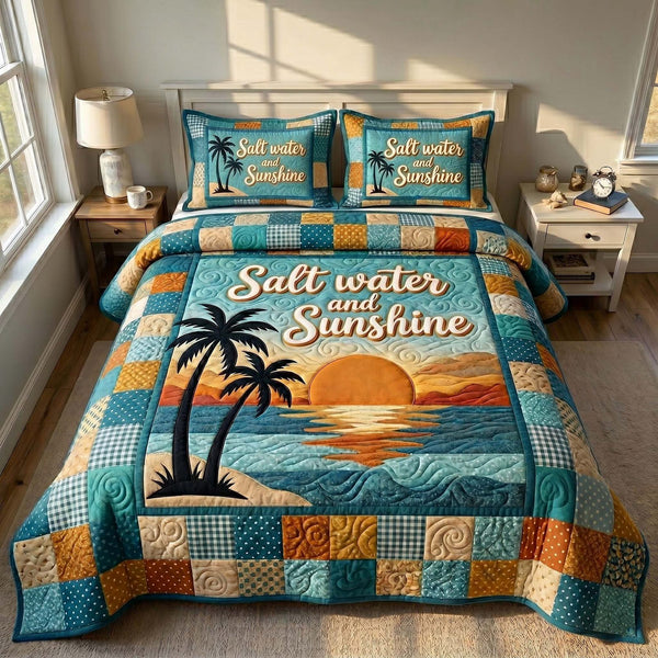 Summer Escape quilted 3-piece bedding set on a made bed with two matching pillow shams