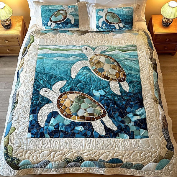 Summer Glow quilted 3-piece bedding set on a made bed with two matching pillow shams