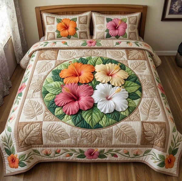 Summer Hibiscus quilted 3-piece bedding set on a made bed with two matching pillow shams
