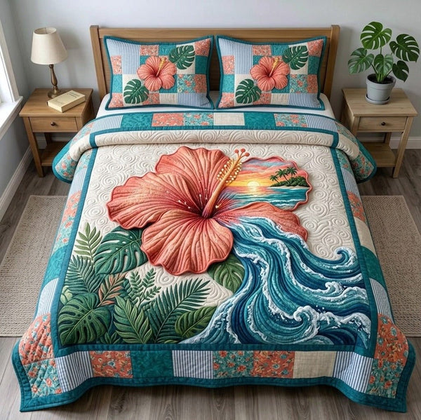 Summer Hibiscus quilted 3-piece bedding set on a made bed with two matching pillow shams