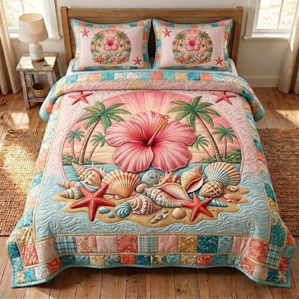 Summer Hibiscus quilted 3-piece bedding set on a made bed with two matching pillow shams
