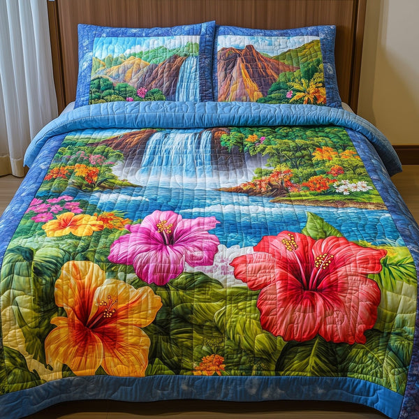Summer Paradise quilted 3-piece bedding set on a made bed with two matching pillow shams