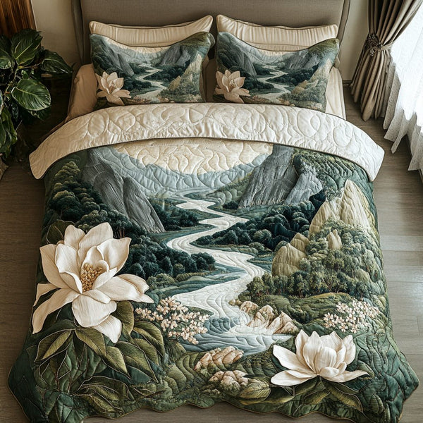 Summit Blossom quilted 3-piece bedding set on a made bed with two matching pillow shams