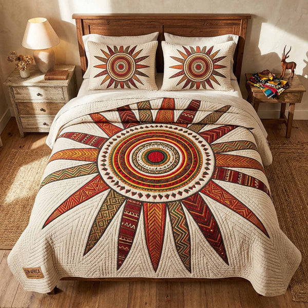 Sun Spirit quilted 3-piece bedding set on a made bed with two matching pillow shams
