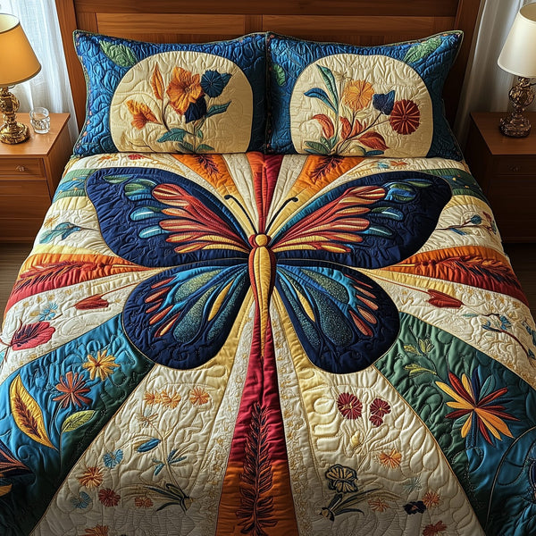 Sunburst Butterfly quilted 3-piece bedding set on a made bed with two matching pillow shams