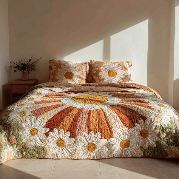 Sunburst Daisy quilted 3-piece bedding set on a made bed with two matching pillow shams