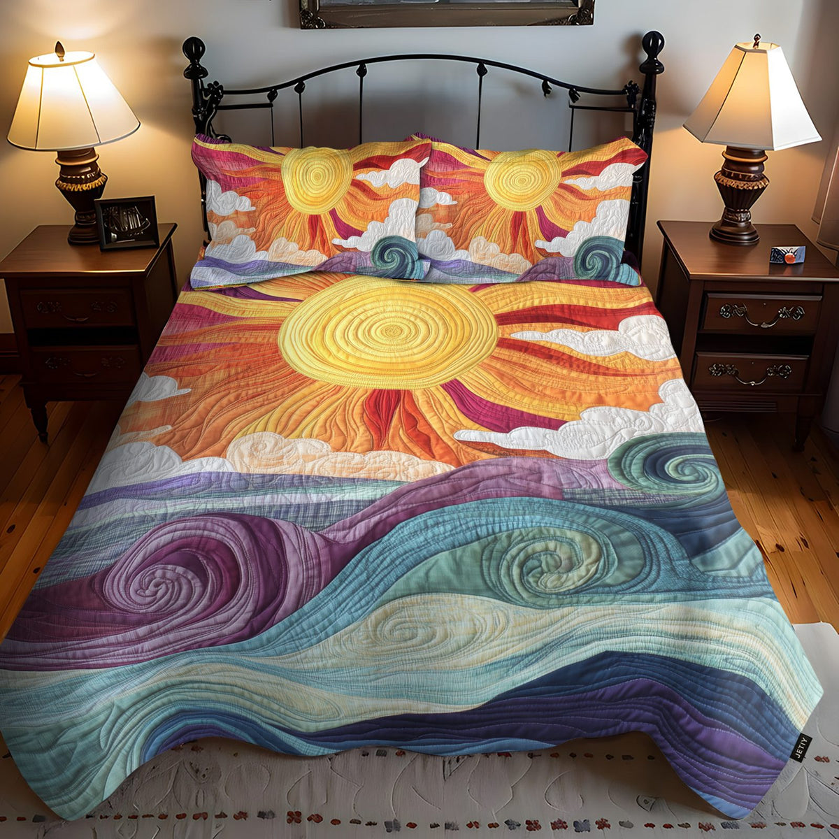 Sunburst Delight quilted 3-piece bedding set on a made bed with two matching pillow shams