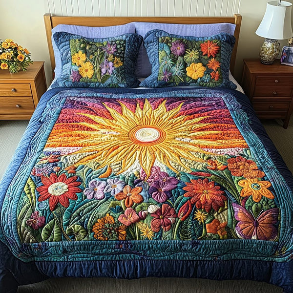 Sunburst Dream quilted 3-piece bedding set on a made bed with two matching pillow shams