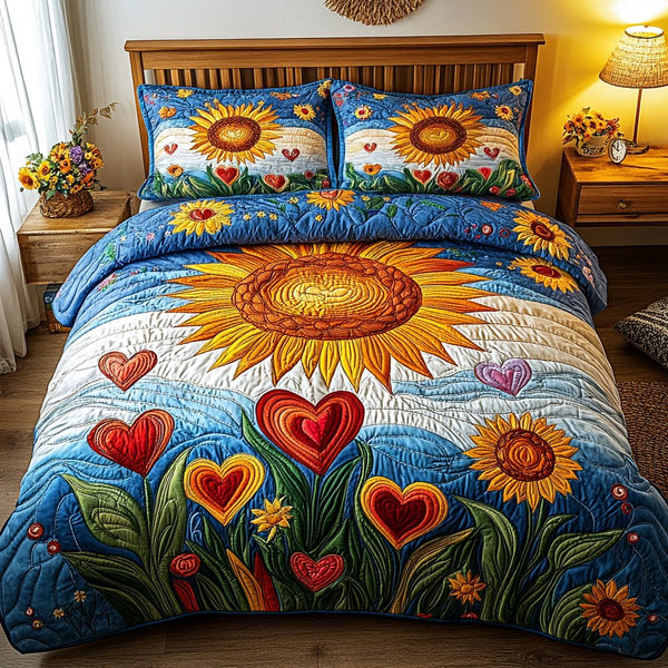 Sunburst Dreams quilted 3-piece bedding set on a made bed with two matching pillow shams