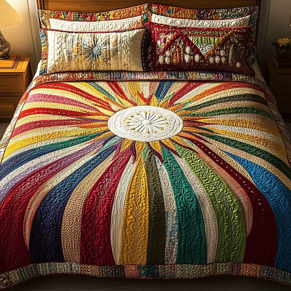 Sunburst Dreams quilted 3-piece bedding set on a made bed with two matching pillow shams