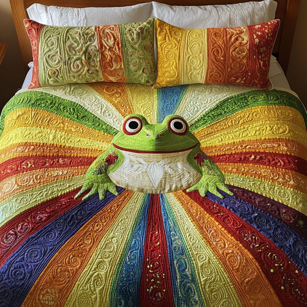 Sunburst Frog Magic quilted 3-piece bedding set on a made bed with two matching pillow shams