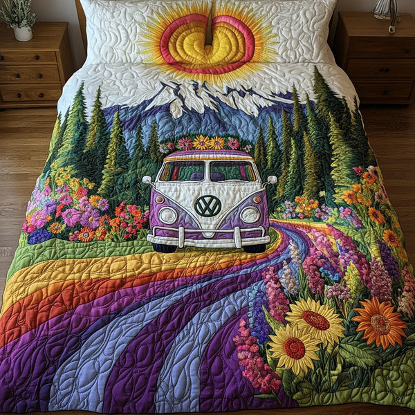 Sunburst Trip quilted 3-piece bedding set on a made bed with two matching pillow shams