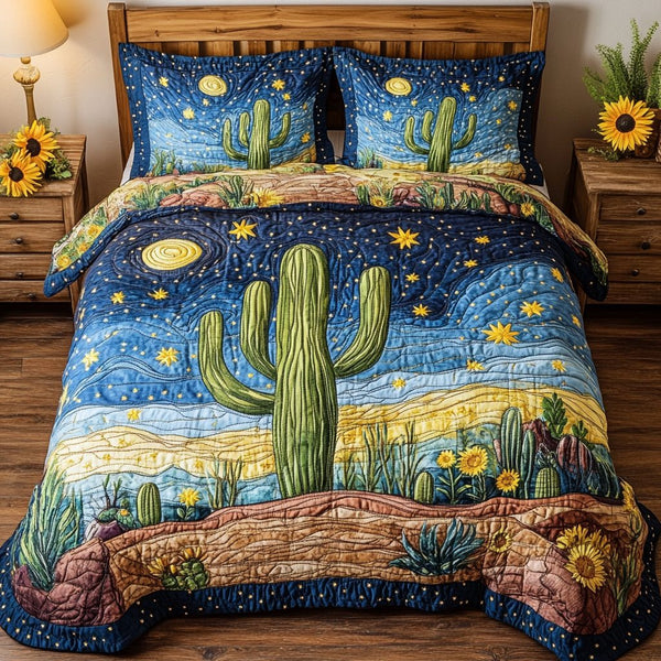Sundown Desert quilted 3-piece bedding set on a made bed with two matching pillow shams