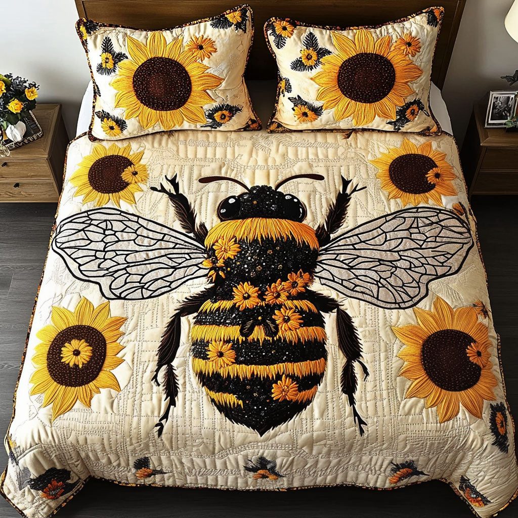 Sunflower Buzz quilted 3-piece bedding set on a made bed with two matching pillow shams