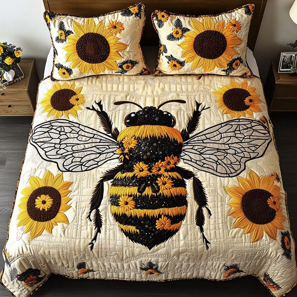 Sunflower Buzz quilted 3-piece bedding set on a made bed with two matching pillow shams