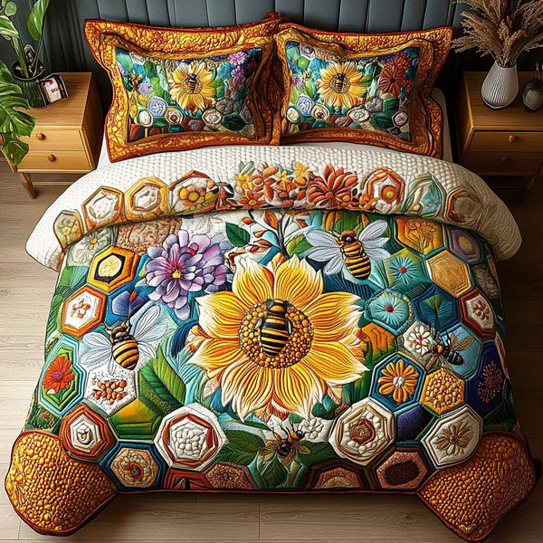 Sunflower Buzz quilted 3-piece bedding set on a made bed with two matching pillow shams