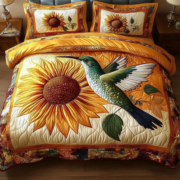 Sunflower Flight quilted 3-piece bedding set on a made bed with two matching pillow shams