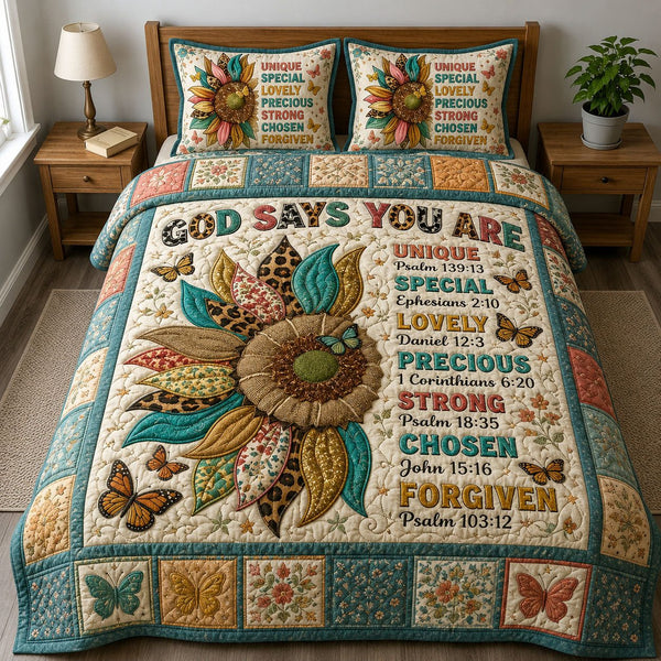 Sunflower God Says You Are quilted 3-piece bedding set on a made bed in a softly lit bedroom