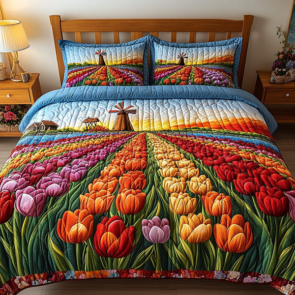 Sunlit Blooms quilted 3-piece bedding set on a made bed with two matching pillow shams
