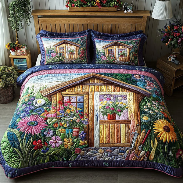 Sunlit Garden quilted 3-piece bedding set on a made bed with two matching pillow shams