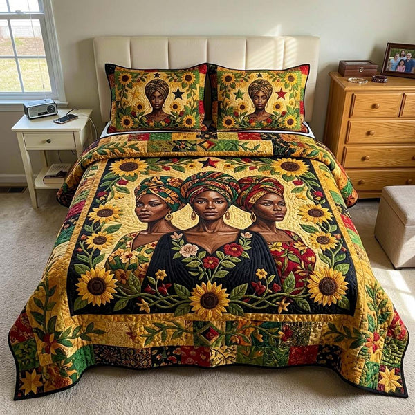 Sunlit Liberation quilted 3-piece bedding set on a made bed with two matching pillow shams
