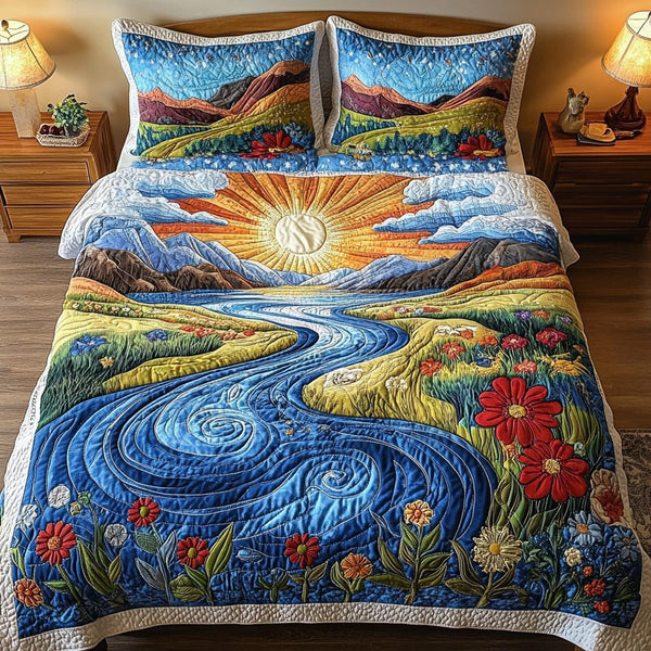 Sunlit Meadows quilted 3-piece bedding set on a made bed with two matching pillow shams